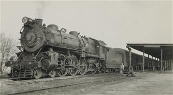 (TRAINS--PENNSYLVANIA RAILROAD) A binder assembled by the artist Lewis Smith with approximately 280 snapshots of steam locomotives.